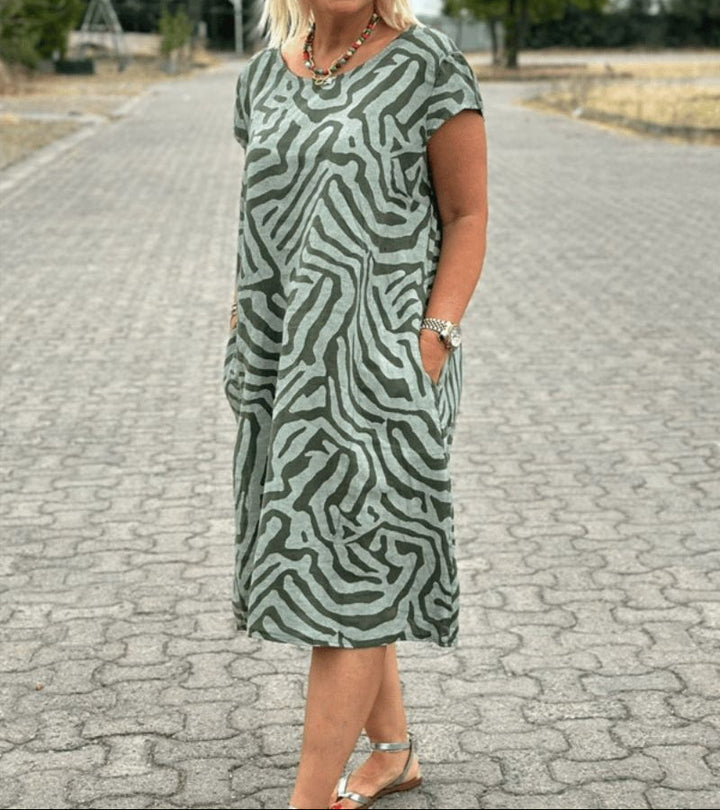 Solina™ – Kleid mit Rundhalsausschnitt und wunderschönem, bauchbedeckendem Print