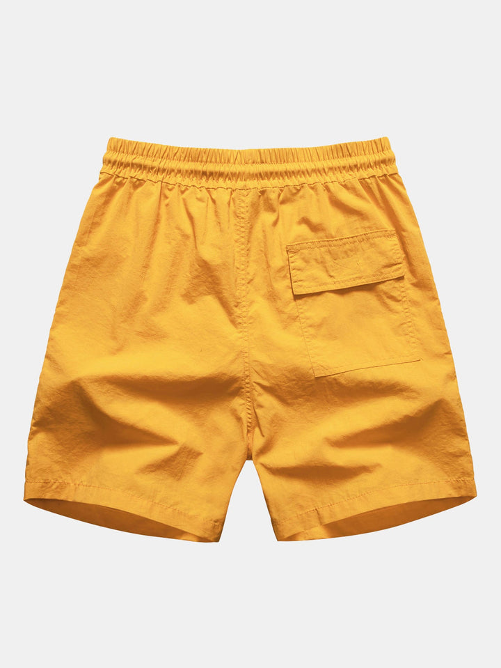 Hemd mit Palmenmuster und Shorts zum Schwimmen